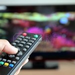11151890-hand-pointing-a-tv-remote-control-towards-the-television